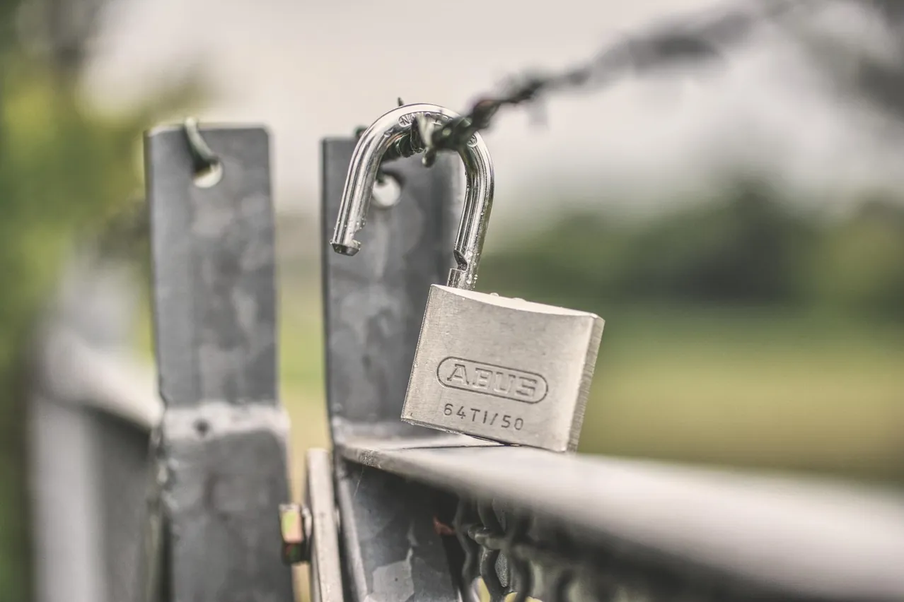 Castle, padlock, barbed wire