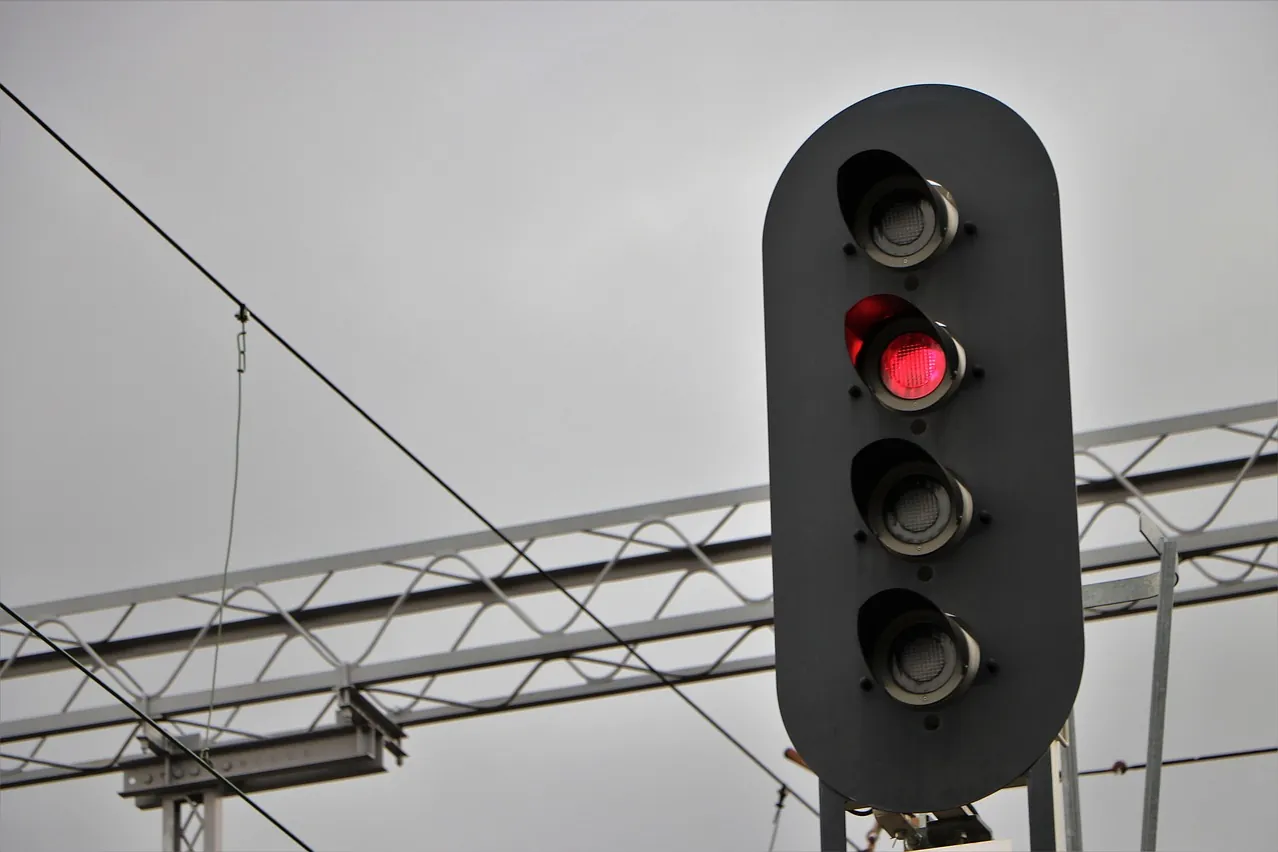 Railroad signal, cables, red signal